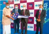  ??  ?? SBI chairman Dinesh Khara takes part in CSR activity in Hyderabad on Tuesday.