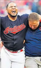  ?? JASON MILLER/GETTY ?? Edwin Encarnacio­n is helped off the field after spraining his ankle in the first inning of Friday’s ALDS game.
THE SCHEDULE Indians 4, Yankees
Indians 9, Yankees
at Yankees 7:30 p.m. Sunday, FS1
at Yankees 7 p.m. Monday, FS1
at Indians 8 p.m....