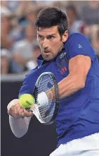  ?? GETTY IMAGES ?? Despite being seeded 14th and being off for six months, Novak Djokovic is one of the favorites to win the Australian Open.