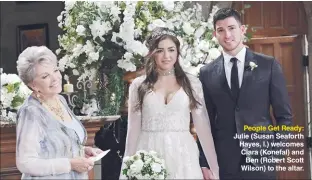  ??  ?? People Get Ready: Julie (Susan Seaforth Hayes, l.) welcomes Ciara (Konefal) and Ben (Robert Scott Wilson) to the altar.