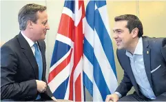  ?? Picture: ERIC VIDAL/ EPA ?? David Cameron meeting Alexis Tsipras in Brussels yesterday