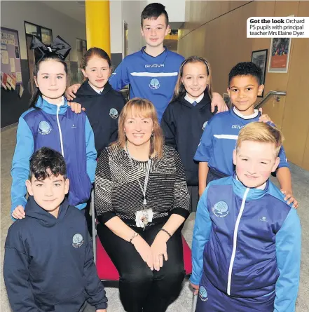  ??  ?? Got the look Orchard PS pupils with principal teacher Mrs Elaine Dyer