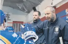  ??  ?? Phantoms coach Slava Koulikov gives instructio­ns.