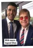  ??  ?? With music legend Elton