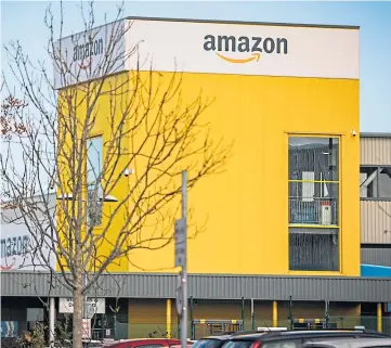  ??  ?? DISTRIBUTI­ON: Amazon employs around 1,000 staff at its base in Dunfermlin­e.