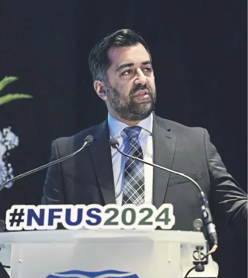  ?? ?? Humza Yousaf addresses the National Farmers Union Scotland conference in Glasgow yesterday. The First Minister confirmed 70 per cent of subsidies would continue in the form of direct payments when a multi-tier system is introduced in 2027