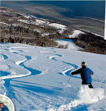  ??  ?? Icicle works: Colin, above, tackled a Le Massif slope that curls into the woods; an art gallery at Baie-St-Paul; and the Club Med Village