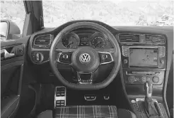  ??  ?? Inside, VW’s GTD offers tartan cloth sport seats and multifunct­ion, leather-trimmed, flat-bottomed sport steering.