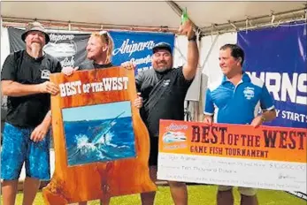  ?? PICTURE / SUPPLIED ?? Stanley Phillips, Taylor Anderson and Preston Drage are presented with the first place prize winnings at the Best of the West tournament by Ahipara Gamefish Club president Robbie Matthews on Tuesday night.