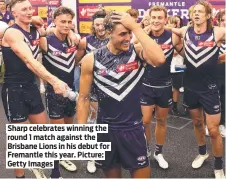  ?? ?? Sharp celebrates winning the round 1 match against the Brisbane Lions in his debut for Fremantle this year. Picture: Getty Images