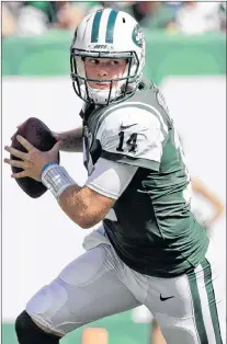  ?? AP PHOTO ?? In this Sept. 16 file photo, New York Jets’ Sam Darnold (14) rolls out during the first half of an NFL football game against the Miami Dolphins in East Rutherford, N.J.