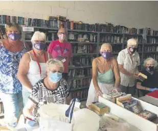  ??  ?? The team of volunteers - all masked up and ready to go