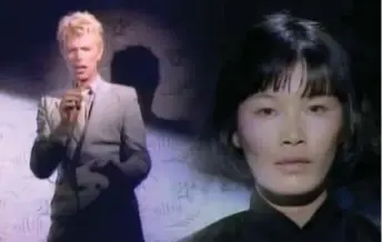  ??  ?? David Bowie and Geeling Ching in a scene from the 1983 music video for his song "China Girl."