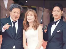  ?? FOTO: IMDB ?? ►► Hong Sang-Soo, Isabelle Huppert y Yoo Joo-Sang en el Festival de Cannes 2012.