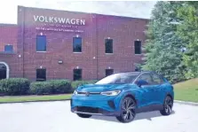  ?? CONTRIBUTE­D IMAGE BY VOLKSWAGEN ?? An image of an ID.4 SUV sits in front of the Volkswagen Chattanoog­a Engineerin­g and Planning Center.