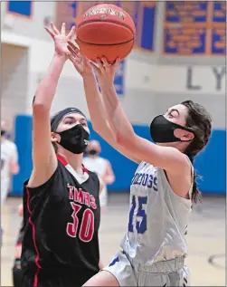  ?? SEAN D. ELLIOT/THE DAY ?? Lyman Memorial guard Kate Anderson shoots over Tourtellot­te defender Hailey Johnson (30) in Wednesday night’s ECC North Division girls’ basketball game in Lebanon. Lyman won 28-23.