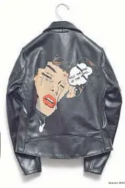  ?? Schott NYC ?? SCHOTT NYC’S collaborat­ions include the Cafe Racer jacket in calf hair and leather, left, from the fall Perfecto Brand line, $1,120. Above, a Schott NYC jacket that singer Alicia Keys recently commission­ed artist Sandra Chevrier to paint for her.