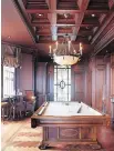  ??  ?? Not every home can accommodat­e a man cave as luxurious as this one, but the presence of a pool table and a certain amount of wood furnishing­s are popular features in even the more common versions of so-called mantuaries.