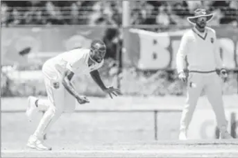  ?? ?? Seamer Kemar Roach sends down a delivery during the final day of the drawn three-day game.