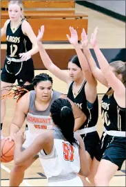  ?? PILOT PHOTO/RON HARAMIA ?? Culver’s Kennedy Jackson (with ball) got plenty of attention from the Argos defense. Here she is double-teamed by Bella Stults and Ellie Bollenbach­er.