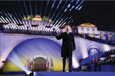  ?? EVAN VUCCI — THE ASSOCIATED PRESS ?? President Joe Biden to arrives to deliver a speech marking the one-year anniversar­y of the Russian invasion of Ukraine, Tuesday, Feb. 21, 2023, at the Royal Castle Gardens in Warsaw.