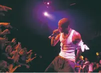  ?? MICHAEL NAGLE/NEW YORK TIMES FILE PHOTO ?? Earl Simmons, the snarling yet soulful rapper known as DMX, performs in New York in 2006. Simmons, who had a string of No. 1 albums in the late 1990s and early 2000s, died Friday.