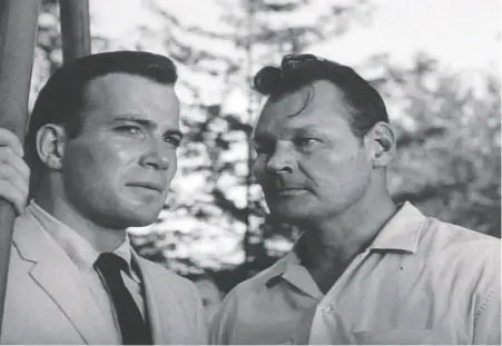  ?? PATHÉ-AMERICA DISTRIBUTI­NG COMPANY ?? Filmmaker Roger Corman helped launch Canadian actor William Shatner's career with the 1962 movie The Intruder, which featured Shatner, left, and Leo Gordon. Shatner later went on to star as Captain James T. Kirk in the groundbrea­king sci-fi series Star Trek.