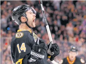  ??  ?? Bruins right wing Brett Connolly celebrates his goal against the Rangers.