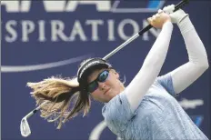  ?? ASSOCIATED PRESS ?? BROOKE M. HENDERSON WATCHES her tee shot on the 17th hole during the third round of the LPGA’s ANA Inspiratio­n golf tournament at Mission Hills Country Club in Rancho Mirage, Calif., on Saturday.