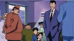  ??  ?? Professor Agasa, Inspektor Megure, die Detective Boys und Kogoro Mori haben eine harte Nuss zu knacken