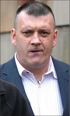  ??  ?? In the dock: Ronnie Coulter, 48, denies a charge of murder