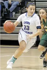  ?? LUIS SÁNCHEZ SATURNO/NEW MEXICAN FILE PHOTO ?? St. Michael’s Jocelyn Fernandez wants to continue playing basketball and throwing the javelin in college, and she is looking at a few out-of-state schools as well as New Mexico Highlands (for basketball).