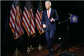  ?? (AP/Matt Rourke) ?? Democratic presidenti­al candidate Joe Biden leaves after speaking Thursday about the coronaviru­s in Wilmington, Del.