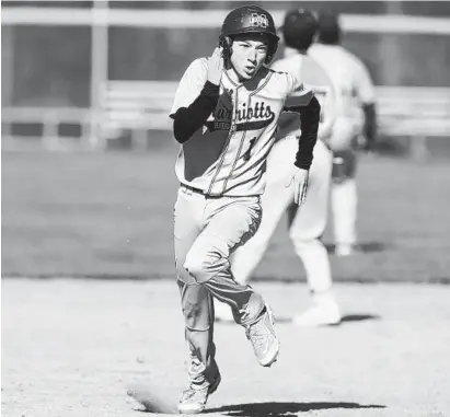  ?? DANIEL KUCIN JR./BALTIMORE SUN MEDIA GROUP ?? Marriotts Ridge’s Rowan Keyser rounds the bases to score during the Mustangs’ 5-2 victory over River Hill on Friday afternoon.