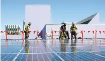 ?? KARL MONDON/STAFF ARCHIVES ?? Building, installing and maintainin­g renewable energy sources is one of the fastest-growing job sectors in the country. Wind and solar combined employ almost 400,000 today, and the number is growing.