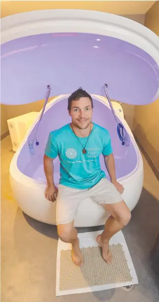  ?? Picture: RICHARD GOSLING ?? Ben Mawson with a sensory deprivatio­n tank at Freedom Float Centre.