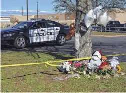  ?? CAROLYN KASTER/AP ?? A Walmart employee who survived last week’s mass shooting at a store in Virginia said in a lawsuit filed Tuesday that a store supervisor, who killed six people in a shooting in Nov. 22, “had a personal vendetta against several Walmart employees and kept a ‘kill list’ of potential targets prior to the shooting.”