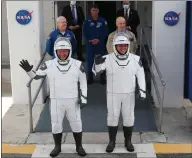  ??  ?? Bad weather delayed Nasa astronauts Bob Behnken and Doug Hurley’s launch in the Spacex Falcon 9 rocket from Cape Canaveral, Florida. Nasa will try again tomorrow.