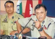  ?? PTI ?? Jammu and Kashmir Police IG Munir Khan briefing media about the arrests in Srinagar on Monday.