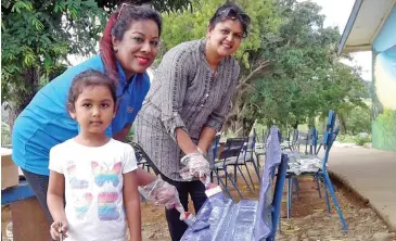  ?? Photo: Salote Qalubau ?? Soroptimis­t Internatio­nal Lautoka branch president, Zareena Bi (middle), with her granddaugh­ter Anaya Khan and Lorin Sahib at the Andrah Sangam Primary School in Lautoka.