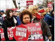  ?? JACQUELYN MARTIN / ASSOCIATED PRESS ?? Betty Shadrick of Albany, N.Y., a member of the United University Profession­s union, rallies Monday outside the U.S. Supreme Court building on behalf of unions. The court was deciding whether states can collect union fees even from non-members.