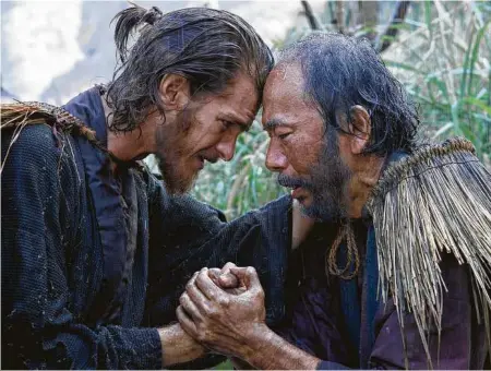  ??  ?? Andrew Garfield, left, and Shin’ya Tsukamoto star in “Silence.”