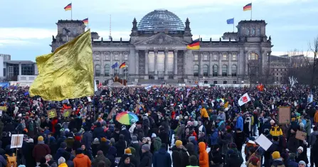  ?? — AFP photo ?? Participan­ts gather during a demonstrat­ion against racism and far right politics in front of the Reichstag building in Berlin, Germany.