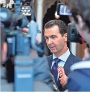  ?? SANA VIA AP FILE ?? Syria’s President Bashar Assad on Friday criticized a U.S. missile strike on a government-controlled air base that U.S. officials said was the origin of a deadly chemical attack. Syria called the operation “an aggression” that killed at least six.