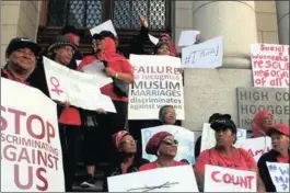  ??  ?? Muslim women gathered outside the Western Cape High Court to support the applicatio­n for Muslim marriages to be recognised by government.