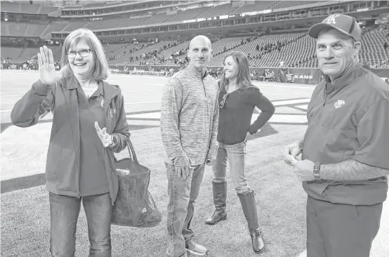  ?? Yi-Chin Lee photos / Houston Chronicle ?? Among family and friends on hand with Sheila, left, and Gary Joseph, right, at NRG Stadium on Saturday were Gary’s brother, Scott, and his fiancée, Shauna Schoonover.