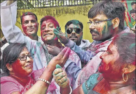  ?? SUBHANKAR CHAKRABORT­Y/HT PHOTO ?? RLD workers celebrate the victory of its candidate, Tabassum Hasan, in Lucknow on Thursday.