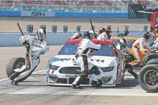  ?? RALPH FRESO/ASSOCIATED PRESS FILE PHOTO ?? Brad Keselowski makes a pit stop March 14 at Phoenix Raceway in Avondale, Ariz.