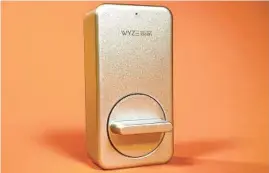  ?? RY CRIST/CNET ?? The Wyze Lock works with your existing deadbolt and key.