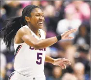  ?? Jessica Hill / Associated Press ?? UConn’s Crystal Dangerfiel­d reacts during the second half of the ACC quarterfin­al game against Temple on Saturday at Mohegan Sun Arena in Uncasville.